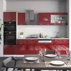 A modern, high-gloss red kitchen unit with integrated appliances and a dining table set for a meal. Anteprima dell’immagine prodotto