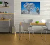Wallario Premium Leinwandbild Schneebedeckter Baum mit Produktbild-Vorschau 3