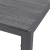 Close-up of the corner of a dark gray outdoor table with a slatted top. Produktbild-Vorschau