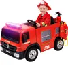 A child dressed as a firefighter is sitting in a toy fire truck. Produktbild-Vorschau
