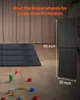 A room with wooden floors, curtains in the background, and children's toys scattered on the floor. A large black mat is laid out, and a tall, black, padded wall protector is shown standing upright. Anteprima dell’immagine prodotto