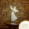 A decorative angel figurine with lights on a table in front of a stone wall. Náhled obrázku produktu