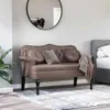 A tufted Chesterfield bench in a room setting, next to a bed. Náhľad obrázku produktu
