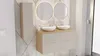 A modern bathroom vanity with two sinks and a tall cabinet. Náhľad obrázku produktu