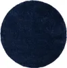 A round, dark blue shag rug is shown from a top-down perspective against a white background. Voir les images du produit