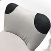 A close-up view of a pillow or headrest on a chair or sofa. Produktbild-Vorschau