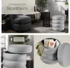 A collage of images showing a gray upholstered storage ottoman and its features. Produktbild-Vorschau