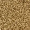 A close-up, overhead view of a pile of light brown, flaky material. Produktbild-Vorschau