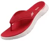 Das Bild zeigt eine rote Sandale die von der Seite betrachtet wird. Die Sandale hat ein schlichtes Design mit einem etwas höheren Absatz und einem breiten Riemen über dem Fuß. Produktbild-Vorschau