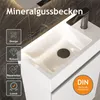 A close-up view of a white mineral cast sink with a black faucet, set against a dark, marbled background. The image includes several overlayed icons and text highlighting product features. Produktbild-Vorschau