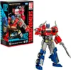 The image shows a Transformers Generations Studio Series Voyager Class Optimus Prime action figure and its packaging. Anteprima dell’immagine prodotto