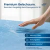 A hand pressing into a blue gel foam mattress topper. Produktbild-Vorschau