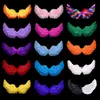 A collection of colorful feather wings arranged in a grid against a black background. Produktbild-Vorschau
