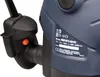 A close-up view of a blue and black router with an orange button and a label with product information. Náhled obrázku produktu