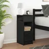 A black nightstand with a drawer and shelves next to a bed. Anteprima dell’immagine prodotto