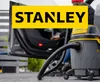 A person is using a Stanley vacuum cleaner to clean the interior of a car. Anteprima dell’immagine prodotto