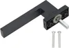 A black window handle with a silver spindle and two silver screws on a white background. Náhľad obrázku produktu