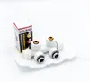 A white radiator connection set with its packaging on a white background. Produktbild-Vorschau