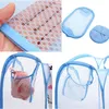 A collage of images showing a blue mesh laundry basket, its material, and how it can be folded and used. Produktbild-Vorschau