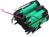 A close-up view of a battery pack with green cylindrical cells and black plastic housing, connected by various colored wires. Voir les images du produit