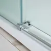 A close-up view of the bottom corner of a shower enclosure, showing the track and a metal bracket holding the glass. Produktbild-Vorschau