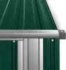 A close-up view of the corner of a green metal garden shed, showing the roofline and a silver trim piece. Náhľad obrázku produktu