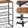 Close-up details of a wooden and black metal shelving unit. Produktbild-Vorschau