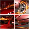 A collage of four images showing details of a red sports car with flames and smoke effects. Produktbild-Vorschau