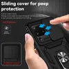 A hand holding a black phone case with a sliding camera cover and a ring stand. Produktbild-Vorschau
