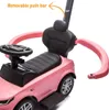 Close-up of a pink ride-on car with a black seat and steering wheel, highlighting a removable push bar. Anteprima dell’immagine prodotto