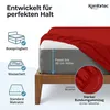 A red fitted sheet is shown on a bed, highlighting its features and compatibility with different mattress types. Produktbild-Vorschau