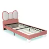 A pink twin bed frame with a bow-shaped headboard and white spherical legs, shown against a white background. Produktbild-Vorschau