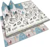A folded play mat with a game board design and animal illustrations. Náhled obrázku produktu