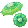 Two umbrellas with a kiwi fruit pattern are shown against a white background. Voir les images du produit