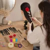 Dámská kadeřnická cvičná hlava se syntetickými vlasy 70 cm Náhled obrázku produktu 10