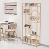 A nail salon setting with a display shelf and a nail desk. Produktbild-Vorschau