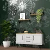 A living room scene with a sideboard, plants, and wall decor. Produktbild-Vorschau