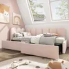 A child's bedroom with a pink upholstered bed and skylights. Podgląd zdjęcia produktu