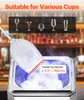 A glass is being frosted by a device in a bar setting. Anteprima dell’immagine prodotto