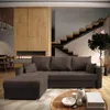 A modern living room with a sectional sofa, fireplace, and staircase. Produktbild-Vorschau