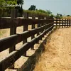 A wooden fence in a dry, grassy outdoor setting. Produktbild-Vorschau