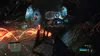 A first-person perspective view of a video game scene with glowing orange energy structures and futuristic technology. Produktbild-Vorschau