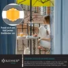 A woman is working on a laptop on a balcony, with a white cat nearby and a yellow umbrella providing shade. Produktbild-Vorschau