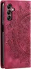 A close-up view of a red flip phone case with a mandala pattern. Produktbild-Vorschau