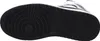 The sole of a white and black Nike sneaker is shown from an underneath view. Anteprima dell’immagine prodotto