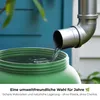 Water is being poured from a downspout into a green barrel. Produktbild-Vorschau