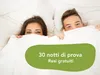 A couple peeking out from under a white duvet. Anteprima dell’immagine prodotto