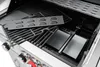 Close-up view of the interior of a stainless steel gas grill, showing the grates and flavorizer bars. Náhled obrázku produktu