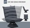 A dark gray floor sofa with a rotating base, shown in multiple positions and angles. Náhled obrázku produktu