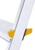 A close-up view of a section of an aluminum ladder, showing a yellow plastic safety clip and a ribbed step. Náhled obrázku produktu